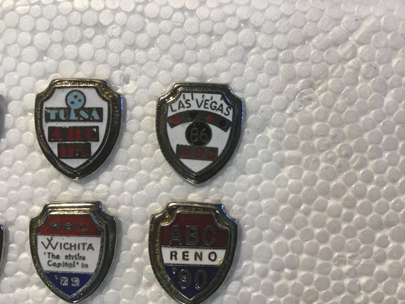 Collection of 16 ABC tournament shield pins - image 7