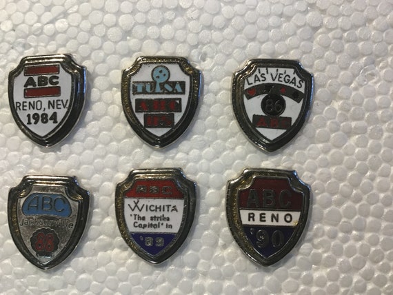 Collection of 16 ABC tournament shield pins - image 2