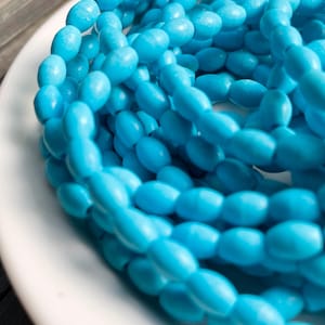 Yava Blue Magnesit 6 x 4 mm Barrel Perlen - 15 &quot;Strang - Sleeping Beauty Türkis Alternative - Southwestern Oval Blaue Perlen