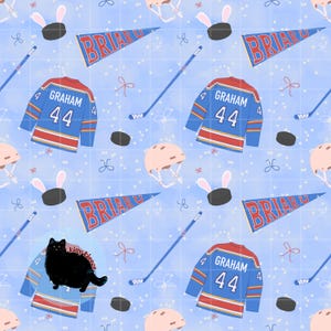 May include: A repeating pattern on a light blue background featuring blue hockey jerseys with the name GRAHAM and number 44, blue and red BRIAR U pennants, hockey sticks, hockey pucks with bunny ears, helmets, and a black cat with kitty kisses text.