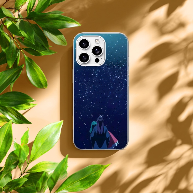 May include: A smartphone case featuring a dark blue night sky filled with white stars. The design depicts two figures viewed from behind, standing together and looking up at the vast, starry expanse. The case has a white camera lens cutout.