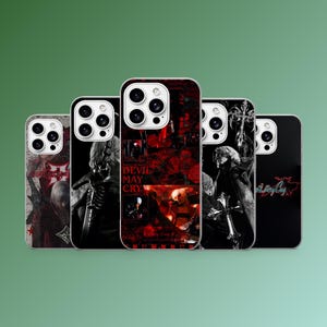 May include: Five phone cases with different designs, predominantly black, red, and white. The cases display images of characters and logos. One case features the text "DEVIL MAY CRY". The cases are designed for a smartphone.