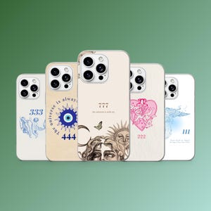 May include: A selection of phone cases with diverse designs. One case shows the number "333" with an angel illustration. Another features an evil eye symbol with the numbers "444". Other cases display the numbers "777", "222", and "111" with different illustrations and text.