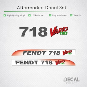 May include: An aftermarket decal set featuring the text 718 VARIO TMS in black, red, and green. The set includes two long rectangular decals with the text FENDT 718 VARIO TMS in black and red on a white background with a red gradient edge.