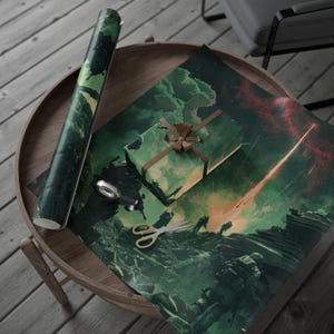 May include: A roll of green and yellow patterned wrapping paper, a wrapped gift with a brown ribbon, and a sheet of matching paper are arranged on a wooden table. Gold scissors and a silver object are also on the table. The paper features a green and black illustration.