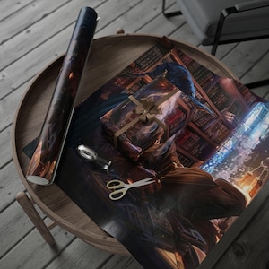 May include: A rolled-up, dark-colored wrapping paper and a wrapped gift with a brown ribbon sit on a wooden table. A pair of scissors and a silver tape dispenser are also on the table. The gift wrap features a fantasy illustration.