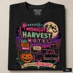 May include: A black t-shirt featuring a graphic print of a motel sign that reads Midnight Harvest Motel, with a large pumpkin, a vintage hearse, a full moon, and text that reads Haunted, Pumpkin Patch, Drive-In, Sleep Is Overrated, and Vacancy.