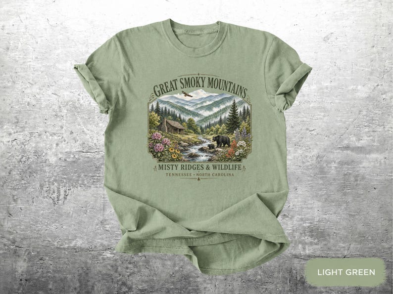 National park inspired shirt with mountains, trees, creek, and flowers