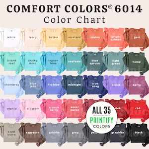 May include: A Comfort Colors 6014 color chart displaying 35 long-sleeve shirts in various shades, including white, ivory, butter, mustard, melon, salmon, yam, reef, mint, blue, spruce, green, hemp, chambray, navy, violet, berry, orchid, blossom, red, and black.