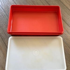 May include: A set of three ceramic mugs with a speckled, matte finish. The mugs are in shades of cream, light gray, and dark gray. Each mug has a simple, minimalist design, perfect for coffee or tea.