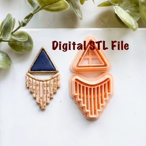 May include: A pair of geometric earrings with a blue triangle top and a peach-colored, fringed bottom with gold accents. Next to it is a peach-colored earring cutter. The text "Digital STL File" is displayed.
