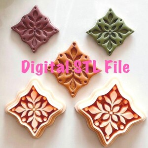 May include: Five diamond-shaped decorative objects in shades of brown, green, and burgundy, each with a floral design. The text "Digital STL File" is displayed in pink. These appear to be cookie cutters or similar craft items.