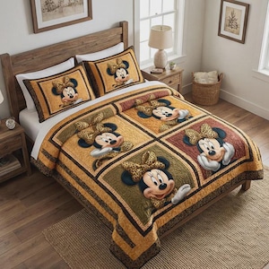May include: A bed set comprising a quilt and two pillowcases. The quilt features a patchwork design with squares of varying colours, each showcasing a Minnie Mouse character with a leopard print bow. The set is in shades of brown, tan, and green.