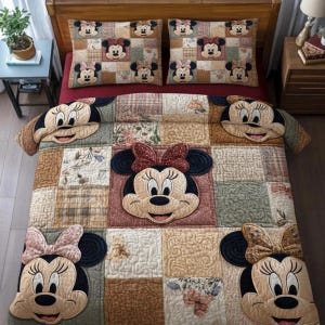 May include: A patchwork quilt and two pillowcases featuring Minnie Mouse. The quilt has a large Minnie Mouse face in the center, surrounded by squares of various patterns and colors. The pillowcases have multiple Minnie Mouse faces.