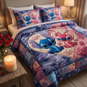 May include: A blue and pink quilt set featuring Stitch and Angel characters. The bedding set includes a quilt and two pillowcases. The quilt has a heart-shaped design with the characters. The color palette includes blue, pink, and purple.