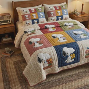 May include: A patchwork quilt and two matching pillowcases featuring Snoopy in various poses with flowers. The quilt has a cream background with colorful squares. The bed is set on a woven rug.