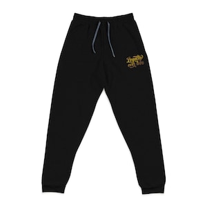 Pantalones deportivos Blike Lion Loyalty over love con parche de bolsillo pequeño
