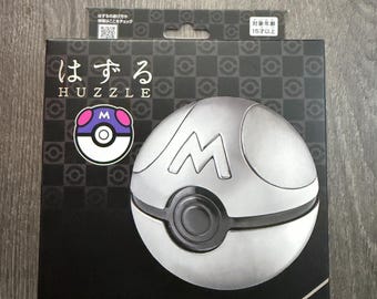 Rompecabezas de la Master Ball Pokémon (Acertijo metálico de Hanayama)
