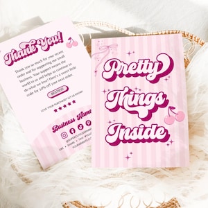 May include: Two rectangular pink and white striped cards with dark pink text. One card reads Thank You with a cherry graphic and discount code BESTIE10. The other card reads Pretty Things Inside with a cherry graphic and a bow illustration.