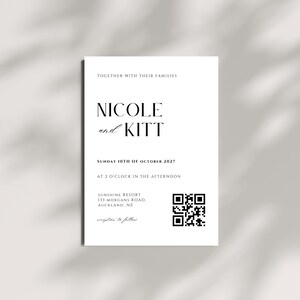 May include: A white rectangular wedding invitation card with black text reading Together with their families, Nicole and Kitt, Sunday 10th of October 2027 at 2 o'clock in the afternoon, Sunshine Resort, 133 Morgans Road, Auckland, NZ, and a QR code.