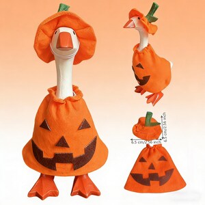 May include: Orange Halloween goose costume set. The set includes a pumpkin-shaped hat and body costume with a jack-o'-lantern face. The hat and costume are made of orange fabric with brown accents. The hat dimensions are 6.5 cm.