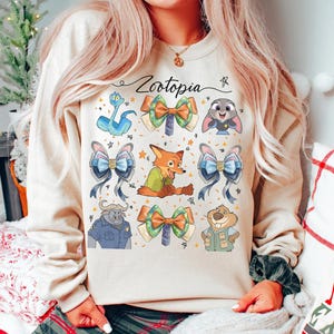Camiseta con lazo coqueto de los personajes de Zootopia 2 de Disney, camiseta de regalo de cumpleaños de Zootrópolis de WDW, camiseta a juego para el viaje familiar a Disneyland. imagen 1