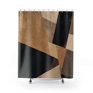 May include: A shower curtain featuring a geometric pattern of large, angular shapes in shades of black, dark brown, and light tan. The design has a textured, weathered appearance across the surface, suspended from a series of silver metal rings.