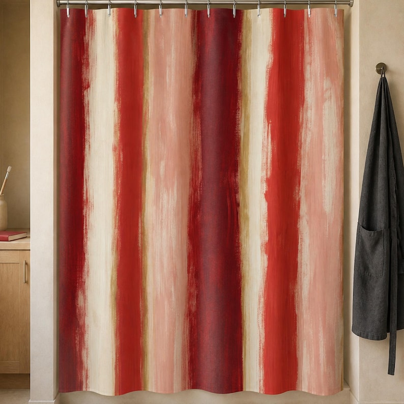 Painterly red stripe shower curtain in an artist loft bathroom with maple cabinet, charcoal smock and red sketchbook