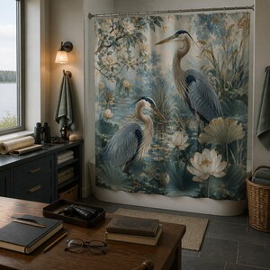Blue green heron and lotus shower curtain in a wetland ecologist's lakeside bathroom