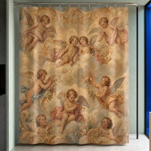 Classical cherub shower curtain in a luxury celadon bathroom with cobalt glass and ochre stone