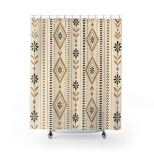 May include: A shower curtain featuring a vertical pattern of brown and tan diamonds, dark brown flowers, and small chevron arrows on a cream background. The design includes repeating columns of geometric shapes and botanical elements.