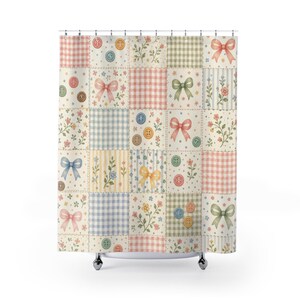 May include: A shower curtain featuring a patchwork grid design with alternating squares of gingham, stripes, and floral patterns. The print includes illustrations of various colored bows and round buttons in shades of pink, blue, green, and yellow.