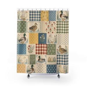 May include: A shower curtain featuring a patchwork design of various ducks, floral patterns, and geometric prints in shades of blue, green, red, and yellow. The grid layout includes illustrations of ducks in water, checkered squares, and polka dots.