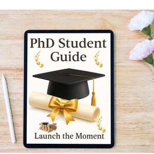 May include: A digital tablet displays a "PhD Student Guide" graphic. The image includes a graduation cap, diploma with a gold bow, and the text "Launch the Moment". The background is a wooden surface.