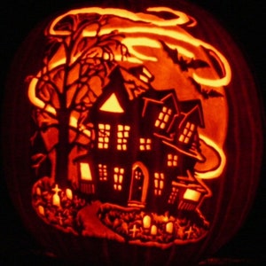Haunted House hand carved on a foam pumpkin