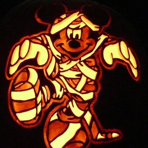 Mickey Mouse Mummy hand-carved on a foam pumpkin for Halloween decorating