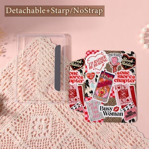 May include: A clear phone case with a gray accent and a patterned phone case with book-themed stickers. The stickers include phrases like "I'd Rather Be Reading" and "Book Addict". The text "Detachable+Starp/NoStrap" is at the top.