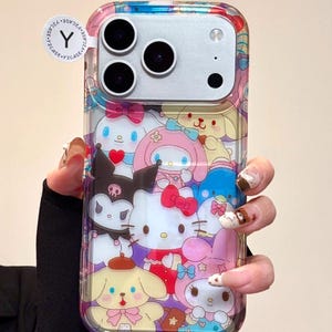 May include: Clear phone case featuring a colorful design with cartoon characters. The case has a variety of characters, including Hello Kitty, My Melody, and others. The case has a clear border and a sticker that says "Y2CASE".