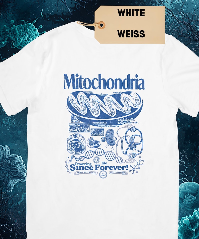 A white short-sleeve t-shirt with a blue graphic of a mitochondria cell and related scientific diagrams and text, with a brown tag that says "WHITE WEISS."