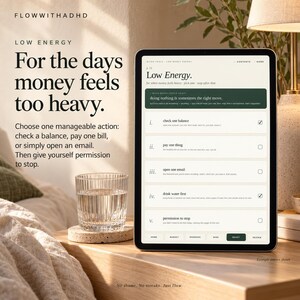May include: A tablet displaying a digital checklist titled Low Energy with five tasks including check one balance and pay one thing. The screen features dark green accents and white text. Beside the tablet sits a clear glass of water on a coaster.