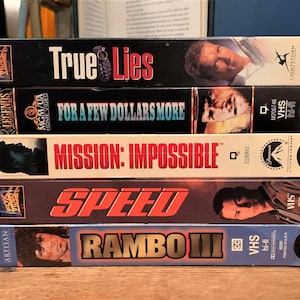 Five Vintage Action VHS Movies Only 20 Dollars Eastwood, Keanu Reeves, Cruise, Schwarzenegger, Sylvester Stallone