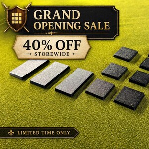 May include: An advertisement with the text "GRAND OPENING SALE" and "40% OFF STOREWIDE." Rectangular and square objects are arranged on a textured, yellow-green surface. The rectangular objects are silver, and the square objects are black. The words "LIMITED TIME ONLY" are also visible.