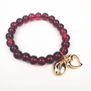 Garnet Red Heart Charm Bracelet: Romantic Deep Ruby Glass Beads, Polished Gold Tone (Stretch Fit, Coffee Bean Charm)