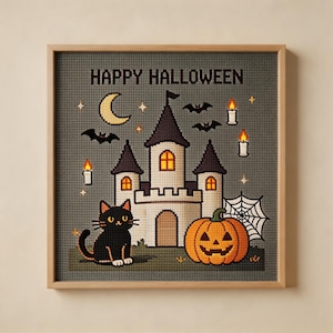 May include: A square cross-stitch embroidery in a light wood frame featuring a grey background with the text HAPPY HALLOWEEN. The design includes a white castle, a black cat, an orange jack-o'-lantern, a crescent moon, bats, and candles.