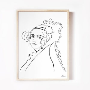 May include: Black and white line art print of a woman with a large, elaborate hairstyle. The print is framed in a light wood frame.