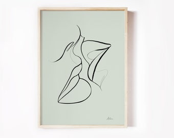 May include: A black and white line drawing of two people kissing, on a light green background. The drawing is framed in a light wood frame.