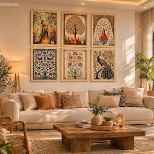 May include: A set of six framed wall art prints arranged in two rows of three, featuring intricate illustrations of figures, a large tree, floral patterns, and a peacock. The prints are displayed above a beige sofa in a living room setting.