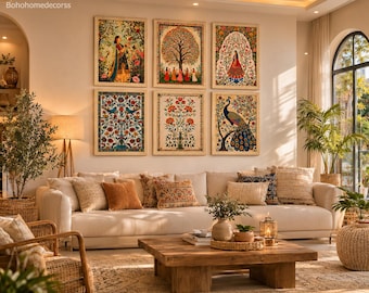 May include: A set of six framed wall art prints arranged in two rows of three, featuring intricate illustrations of figures, a large tree, floral patterns, and a peacock. The prints are displayed above a beige sofa in a living room setting.