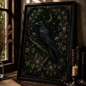 May include: A framed rectangular wall art print featuring a black raven perched on a branch amidst green foliage, white flowers, and a golden crescent moon with stars against a dark background, enclosed in a simple black wooden frame.