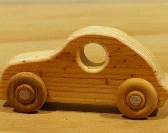 1 ea. Pine Wood Tesla Car